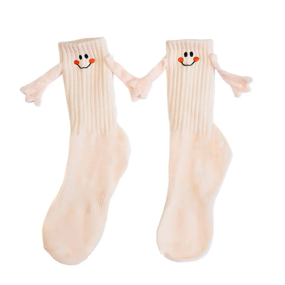 Chaussettes qui se tiennent la main