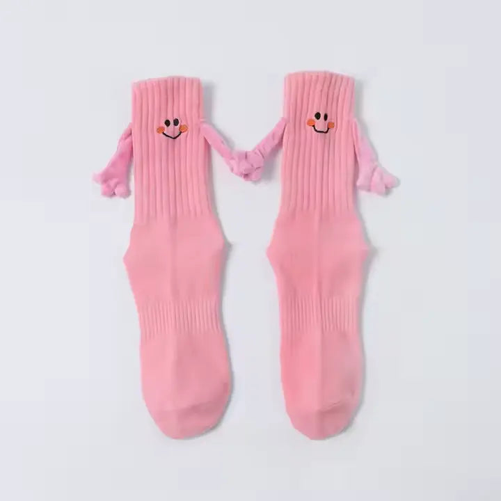 Chaussettes qui se tiennent la main